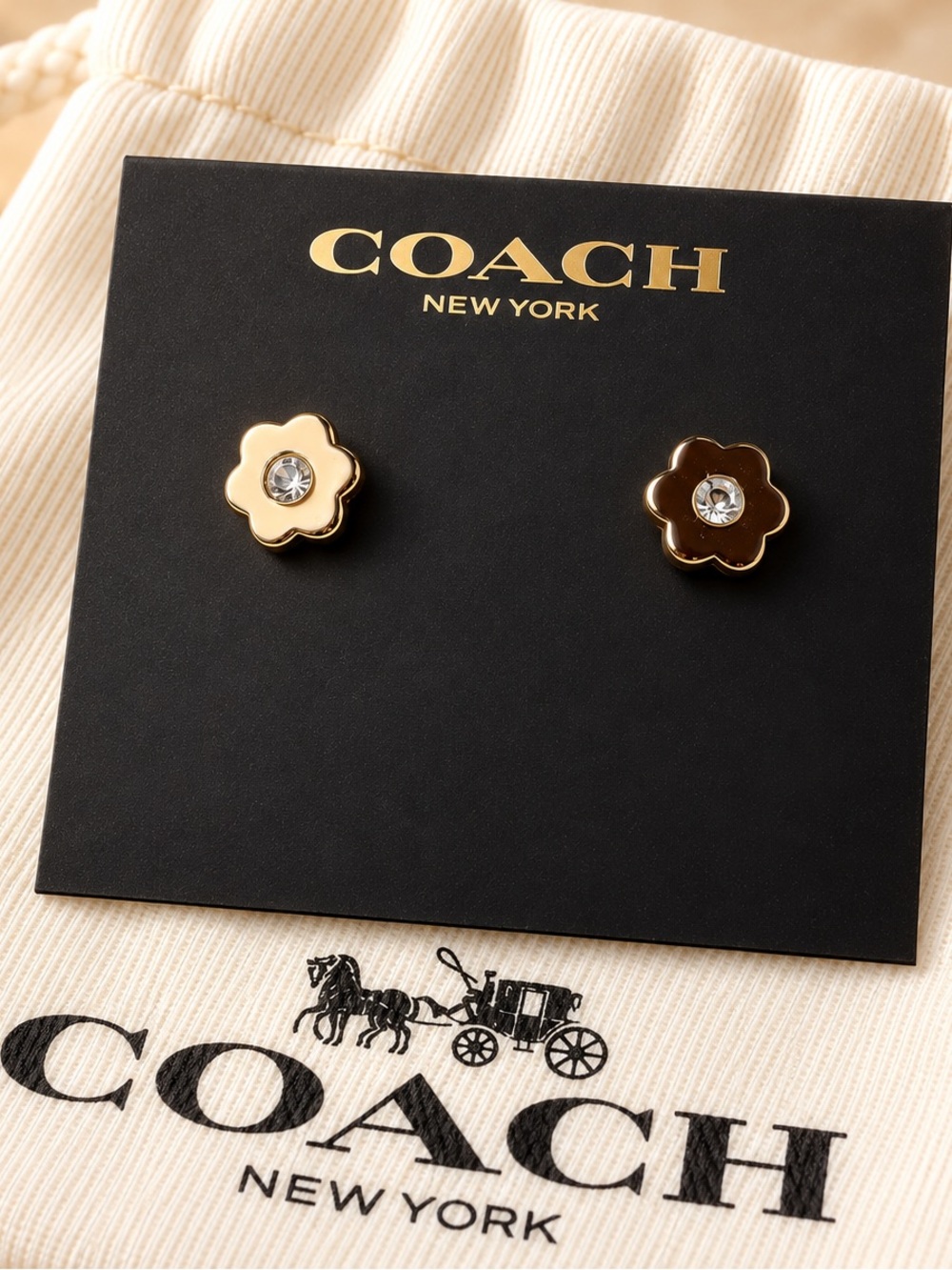 COACH Gold Flower Stud Earrings with Crystal Center